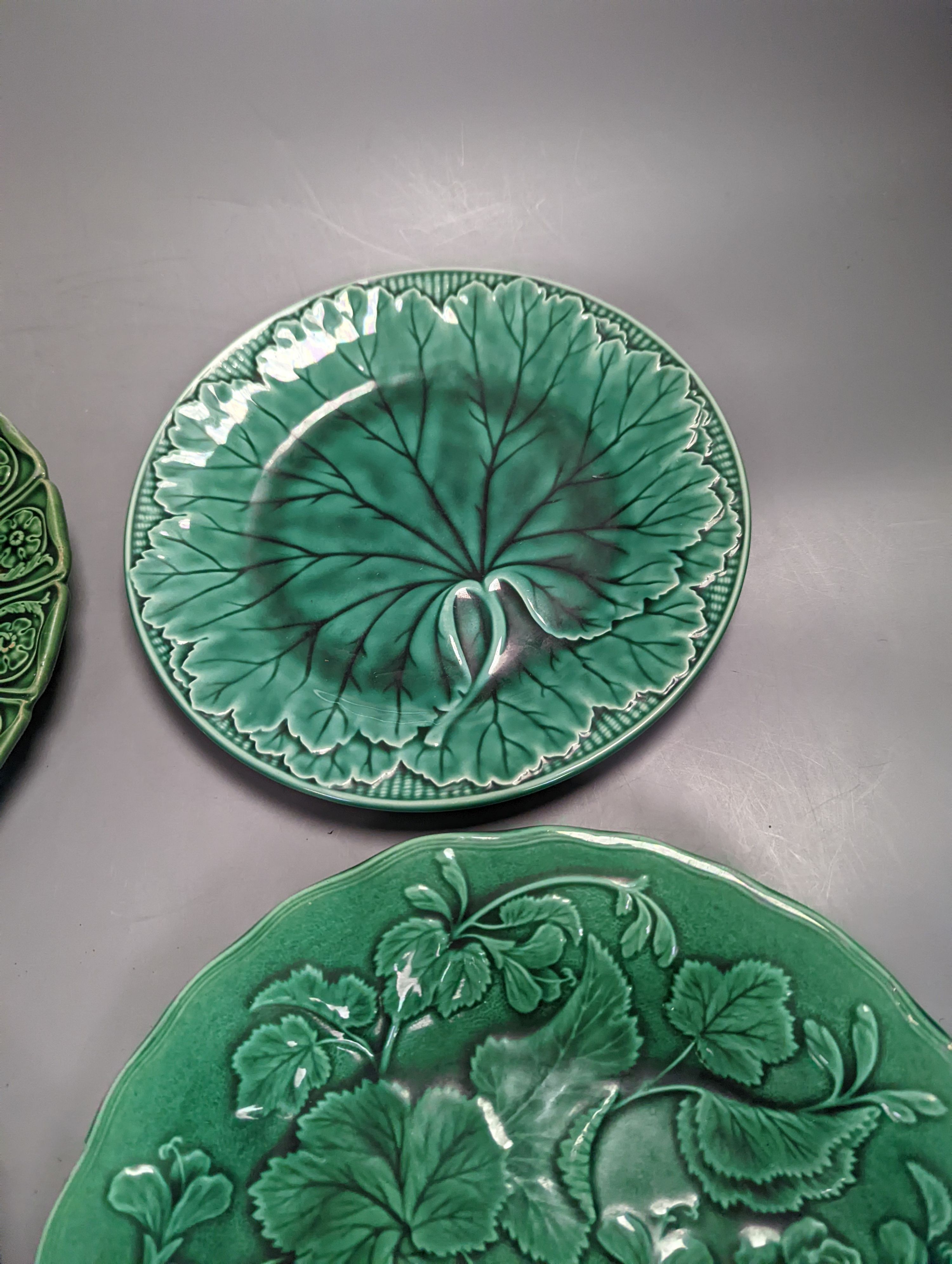 Twelve Victorian and later green glazed leaf dishes, largest 25.5cm